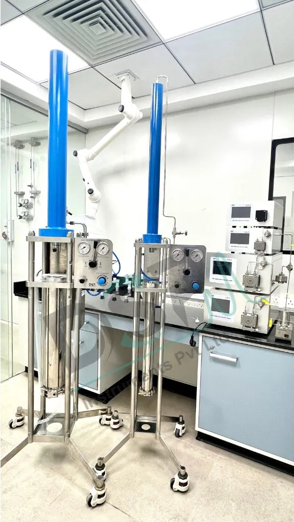 Two mobile stainless steel chromatography columns with Prep HPLC modules and extractor arm