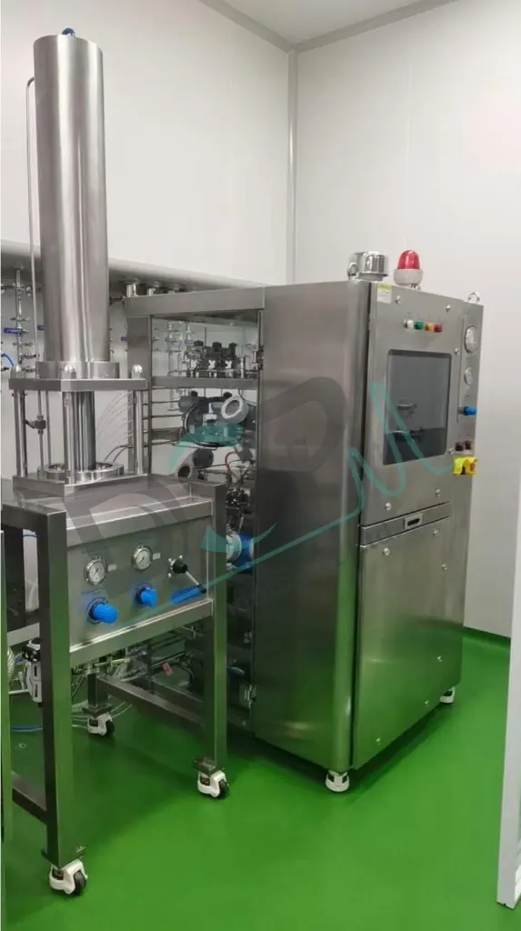 Commercial chromatography skid and DAC column in a cleanroom with green epoxy flooring